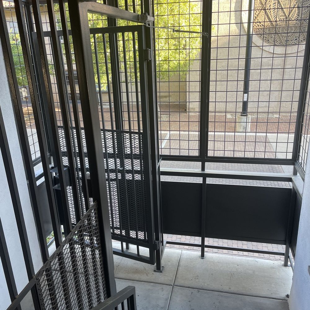 No hinge on door from open garbage to resident stairwell.  Supposed to be locked.  Cellblock A