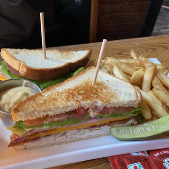 Biltmore Stable Cafe - Club sandwich with french fries and house made pickles (which are absolutely amazing!!) - American Near Me - Asheville, North Carolina Biltmore Stable Cafe - Club sandwich with french fries and house made pickles (which are absolutely amazing!!) - American Near Me - Asheville, North Carolina