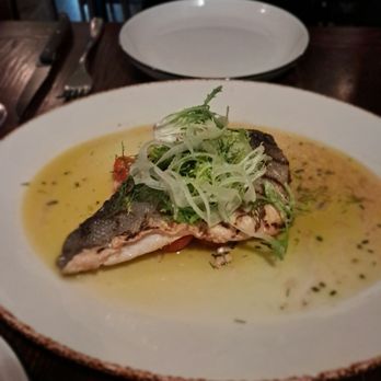 S'Aranella - Grilled branzino, with cherry tomatoes, olives and arugula and onion. - Spanish Near Me - Paso Robles, California