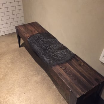 Fireside - Cool bench in the bathroom that fits with the theme of the restaurant - New American Near Me - Portland, Oregon