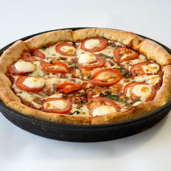 Fresh Brothers Pizza Beverly Hills - Cheesy deep dish Margherita pizza with fresh basil and crushed tomatoes. Rich, bold flavor. - Pizza Near Me - Beverly Hills, California Fresh Brothers Pizza Beverly Hills - Cheesy deep dish Margherita pizza with fresh basil and crushed tomatoes. Rich, bold flavor. - Pizza Near Me - Beverly Hills, California