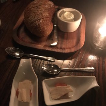 Local 11 Ten - Amuse bouche of black bean hummus with a little me infused radish. The bread is a house made rosemary sour dough - New American Near Me - Savannah, Georgia
