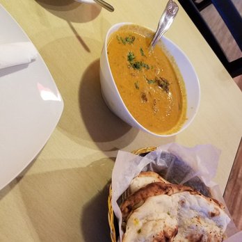 Biryani Express - Goat Korma very intense flavors, basmati rice, and some fresh garlic nann. - Indian Near Me - Pearland, Texas