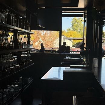 Jack’s on Pearl - Looking to the outside patio in the upstairs - Bars Near Me - Denver, Colorado
