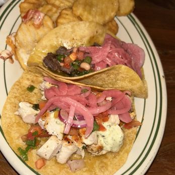 The Daily Tavern - Steak and chicken tacos with a side of waffle fries - New American Near Me - Charlotte, North Carolina