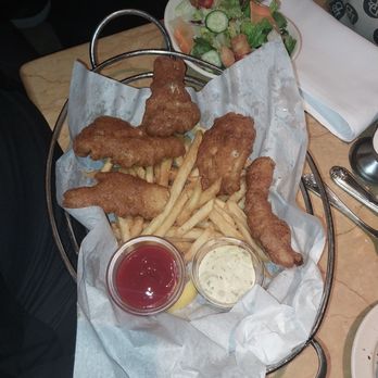 The Cheesecake Factory - Fish and chips with a salad. - American Near Me - Dallas, Texas The Cheesecake Factory - Fish and chips with a salad. - American Near Me - Dallas, Texas