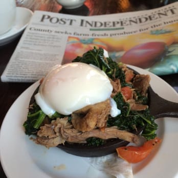 The Pullman - Goat hash on a bed of kale topped with a poached egg. Smells like goat. - New American Near Me - Glenwood Springs, Colorado The Pullman - Goat hash on a bed of kale topped with a poached egg. Smells like goat. - New American Near Me - Glenwood Springs, Colorado