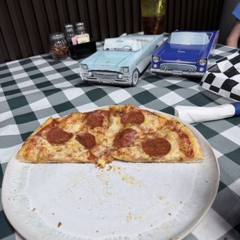 50’s Diner - Half a kids pepperoni pizza and the little cars kids burgers are served it. The pizza was huge and our kids were very happy! - Pizza Near Me - Orlando, Florida