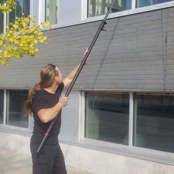 Scenic Glass Cleaning - Damien Using Water Fed Pole System - Window Washing Near Me Scenic Glass Cleaning - Damien Using Water Fed Pole System - Window Washing Near Me