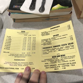 Farinacci Pizza - a hand holding a menu - Pizza Near Me - Brecksville, Ohio