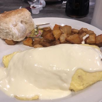 Fork and Spoon - Asparagus, ham and cheese omelette topped with creamy hollandaise sauce - New American Near Me - New Braunfels, Texas