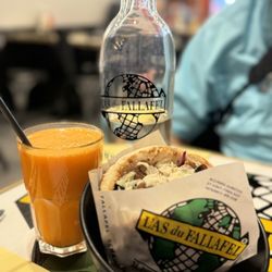 L'As du Fallafel - Falafel sandwich and a carrot orange juice