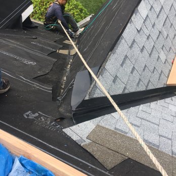 Hector General Contractor - a man working on a roof - General Contractors Near Me Hector General Contractor - a man working on a roof - General Contractors Near Me