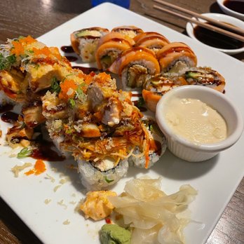 Ru San's - Top - twice cooked smoked salmon roll  Bottom- Queen City Roll White sauce, not sure what it was but it was good - Sushi Bars Near Me - Charlotte, North Carolina