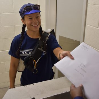 U.S. Messenger - Package being delivered by a bike messenger. - Couriers & Delivery Services Near Me