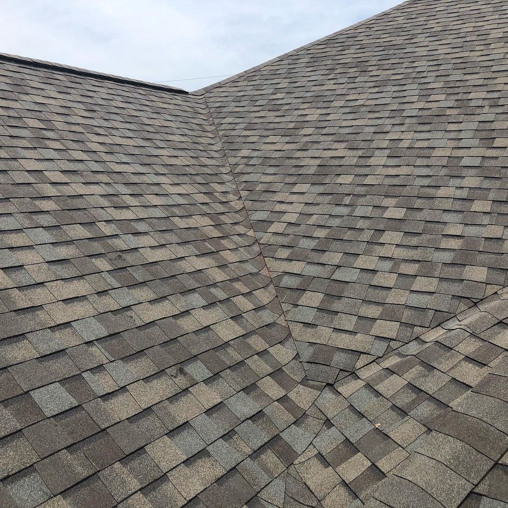 Slide of Vincent's Roofing