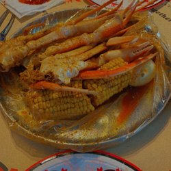 Mr. & Mrs Crab - 1 pound Cajun mild snow crab, 2 corn, 2 potatoes and a boiled egg.