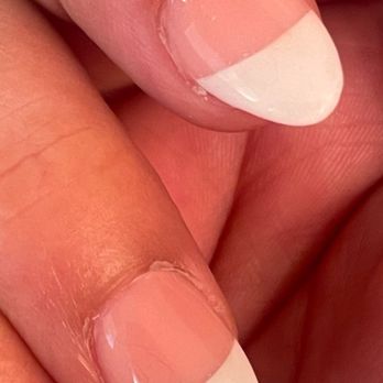 Bien Nails - Second finger cut on middle finger and again overlay of product, and hair inside of nail on ring finger - Nail Salons Near Me - Sun City, Arizona Bien Nails - Second finger cut on middle finger and again overlay of product, and hair inside of nail on ring finger - Nail Salons Near Me - Sun City, Arizona