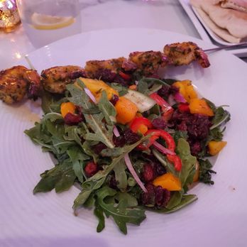 Caspian Mediterranean Kitchen - Mango Arugula Salad with shrimp, and Beef Souvlski Shish Kabob, we also had the Hummus Trio not pictured, but delish! - Persian/Iranian Near Me - Foothill Ranch, California