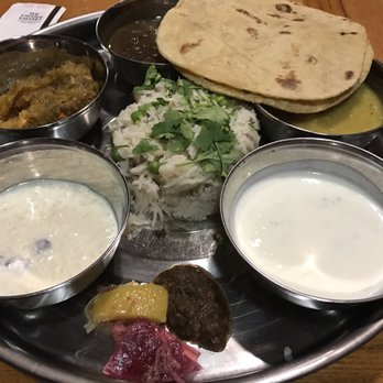 Thali - Thalis (northern Indian little dishes all together on a metal plater) - Indian Near Me - Reno, Nevada Thali - Thalis (northern Indian little dishes all together on a metal plater) - Indian Near Me - Reno, Nevada
