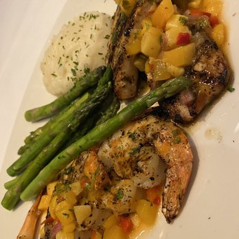 Bonefish Grill - Mahi-mahi and shrimp entree with asparagus and garlic mashed potatoes. Topped w/signature sauce called mango salsa. - Seafood Near Me - Viera, Florida
