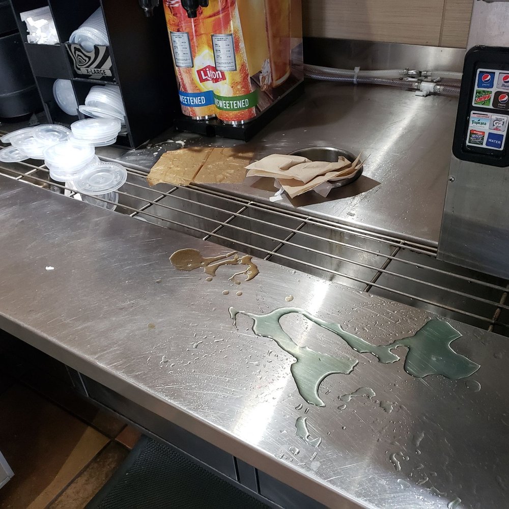 A manager was sitting about 6 feet from this and never once made any effort to clean it before heading back behind the counter. A manager was sitting about 6 feet from this and never once made any effort to clean it before heading back behind the counter.