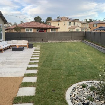 Snow Landscape - a backyard with a patio and seating area - Landscaping Near Me Snow Landscape - a backyard with a patio and seating area - Landscaping Near Me