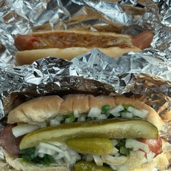 Chuck’s Dog House - Great find and amazing service! She brought our dogs to the car. Gave us an extra side. Def a must for hotdogs!