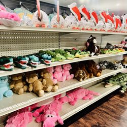 Glades Haven General Store & Marina - Plush alligators, pink and blue plush bear, hand carved coconut pelicans