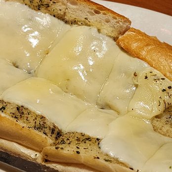 A Slice of Italy - Garlic bread with cheese! Undercooked for my taste! - Pizza Near Me - Kingston, New York A Slice of Italy - Garlic bread with cheese! Undercooked for my taste! - Pizza Near Me - Kingston, New York