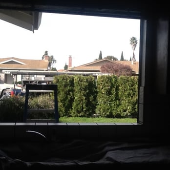 Airtight Vinyl Siding and Windows - Kitchen window with glass and bars removed. - Windows Installation Near Me - Soquel, California