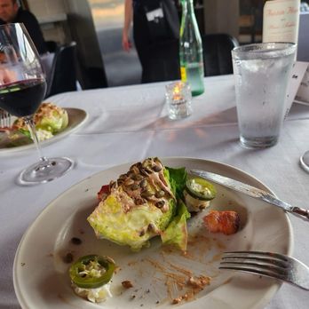 Queenie's Steakhouse - butter lettuce salad with lardons - Steakhouses Near Me - Denton, Texas