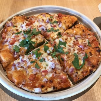 Tikka Shack Indian Grub - Naan pizza. It has Indian taste to it - Indian Near Me - Lubbock, Texas Tikka Shack Indian Grub - Naan pizza. It has Indian taste to it - Indian Near Me - Lubbock, Texas