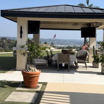 M&M General Construction Services - Building pergola with metal roofing - General Contractors Near Me