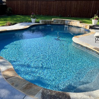 Emerald Custom Pools - The waterfall features turned out beautiful and turned our back yard into an oasis! - Pool & Hot Tub Service Near Me - Saginaw, Texas