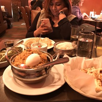 Cardamom - Saag paneer, chicken momos, basmati, naan and lamb biriyani with raita accompaniment. - Indian Near Me - Ann Arbor, Michigan
