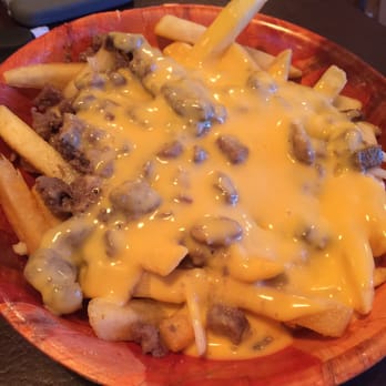 Panda Burgers - Gzus fries. ( fries with mozarella and nacho cheese with some carne asada) - Burgers Near Me - El Paso, Texas Panda Burgers - Gzus fries. ( fries with mozarella and nacho cheese with some carne asada) - Burgers Near Me - El Paso, Texas