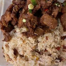 Salt and pepper pork chops with fried rice. Salt and pepper pork chops with fried rice.