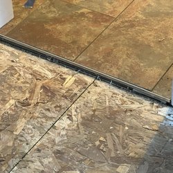 Lowe's Home Improvement - Did not tear everything up to make floor even now needs transitions.