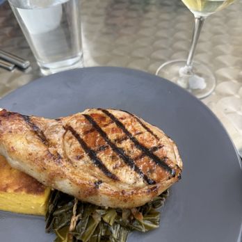 Academy Street Bistro - Pork chop, greens, corn soufflé - New American Near Me - Cary, North Carolina Academy Street Bistro - Pork chop, greens, corn soufflé - New American Near Me - Cary, North Carolina