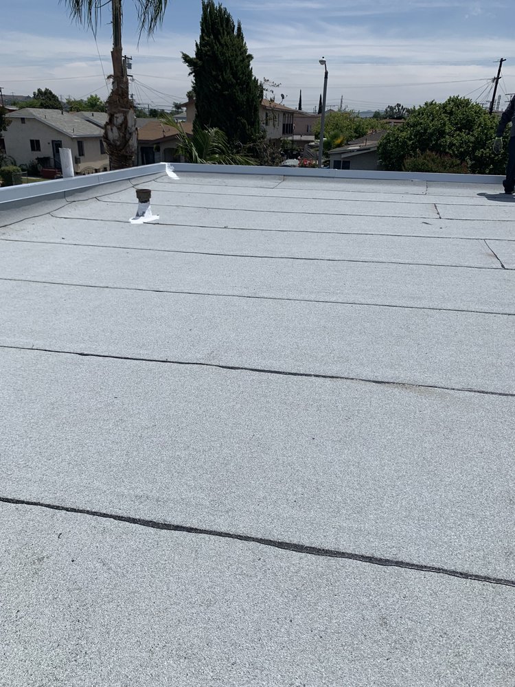 Slide of Pacific Roofing