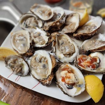 Two Bills Seafood - a plate of fresh oysters - Seafood Markets Near Me - Fort Lauderdale, Florida Two Bills Seafood - a plate of fresh oysters - Seafood Markets Near Me - Fort Lauderdale, Florida