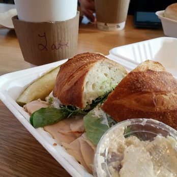 Dollop Coffee - Turkey sandwich on baguette with pickle spear and potato salad on the side - Cafes Near Me - Chicago, Illinois Dollop Coffee - Turkey sandwich on baguette with pickle spear and potato salad on the side - Cafes Near Me - Chicago, Illinois