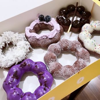Mochinut - Cerritos - Top: Ube coconut, ube cream, ube dark chocolate Bottom: Ube glaze, ube original, ube New York cheesecake - Hot Dogs Near Me - Cerritos, California
