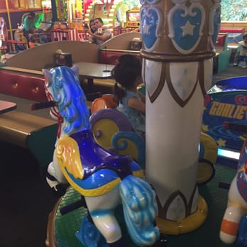 Chuck E. Cheese - Inside with carousel for the smaller kids - Arcades Near Me - Atlanta, Georgia