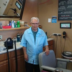 Robert's Barbershop - Dennis at work and in his environment.