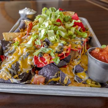 Ledges Pub - a tray of nachos and salsa - New American Near Me - Sebasco Estates, Maine