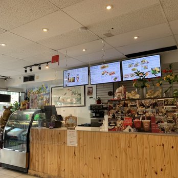 Sapa - the inside of a restaurant with a counter and tvs - Ice Cream & Frozen Yogurt Near Me - Montreal, Quebec Sapa - the inside of a restaurant with a counter and tvs - Ice Cream & Frozen Yogurt Near Me - Montreal, Quebec