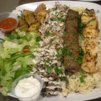 Palmyra Mediterranean House - Palmyra plate - $16.99 w/ grilled chicken, shish tawouk, chicken/beef shawarma, potatoes, & salad. HUGE! - Middle Eastern Near Me - Etobicoke, Ontario Palmyra Mediterranean House - Palmyra plate - $16.99 w/ grilled chicken, shish tawouk, chicken/beef shawarma, potatoes, & salad. HUGE! - Middle Eastern Near Me - Etobicoke, Ontario