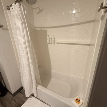 Archer Hotel Burlington - Shower with tub and a cute little rubber ducky - Hotels Near Me - Burlington, Massachusetts Archer Hotel Burlington - Shower with tub and a cute little rubber ducky - Hotels Near Me - Burlington, Massachusetts